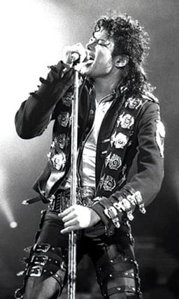 Which Michael Jackson song features a guitar solo by Eddie Van Halen?