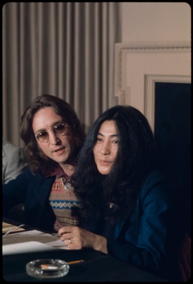 What is the location of John Lennon's burial site?