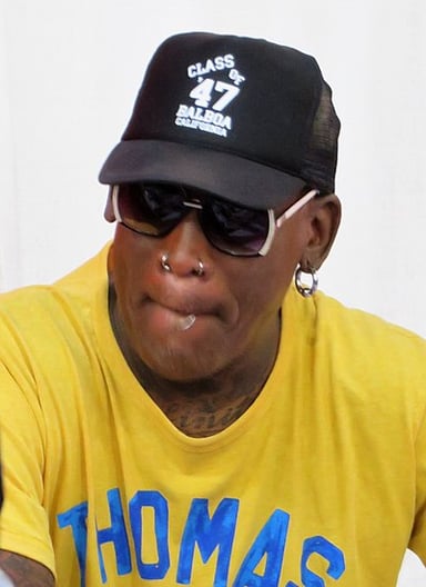 In which year did Dennis Rodman win his first NBA championship?