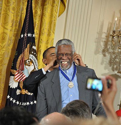 In which position does Bill Russell tend to shine in sports?