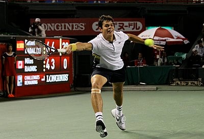 What percentage of service games has Raonic won in the Open Era?