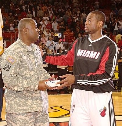 In which year did the Miami Heat retire Dwyane Wade's jersey?