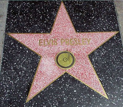 In which year did Elvis Presley first perform live in Las Vegas?
