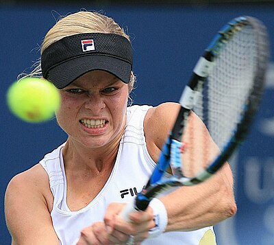 In what year did Kim Clijsters first reach the world No. 1 ranking in singles?