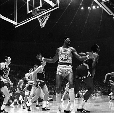 Which team did Wilt Chamberlain join after playing for the Harlem Globetrotters?
