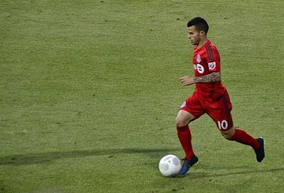 Which former Italian national team player played for Toronto FC?