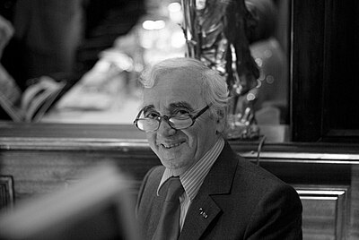 How many gold and platinum records did Aznavour receive between 1974 and 2016?